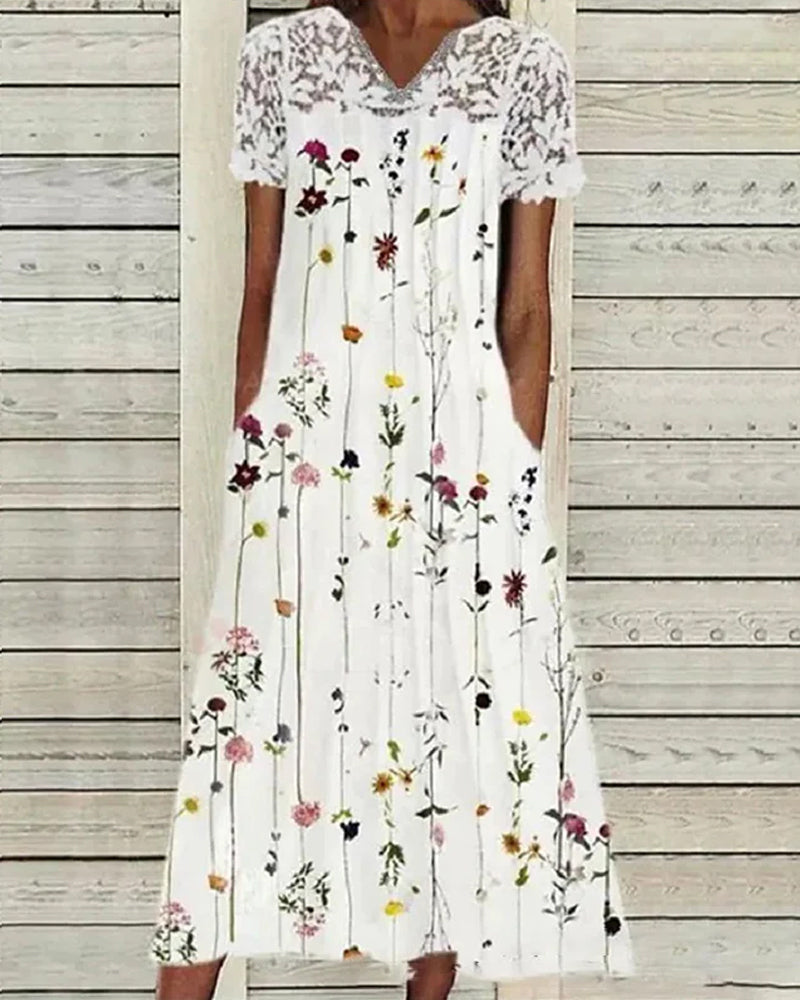 Kleid mit Blumendruck am Ausschnitt und Spitzenärmeln