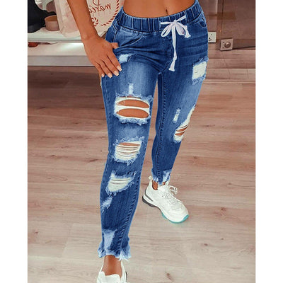 Tina's Zerrissene Jeans